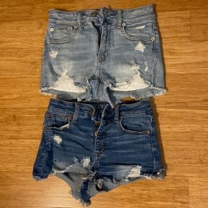 Two pairs of American Eagle High Rose Shortie ripped jean shorts